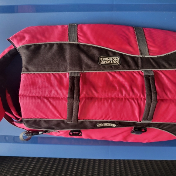 Dog safety vest for swimming.Excellent conditionUp to 100 pounds.
